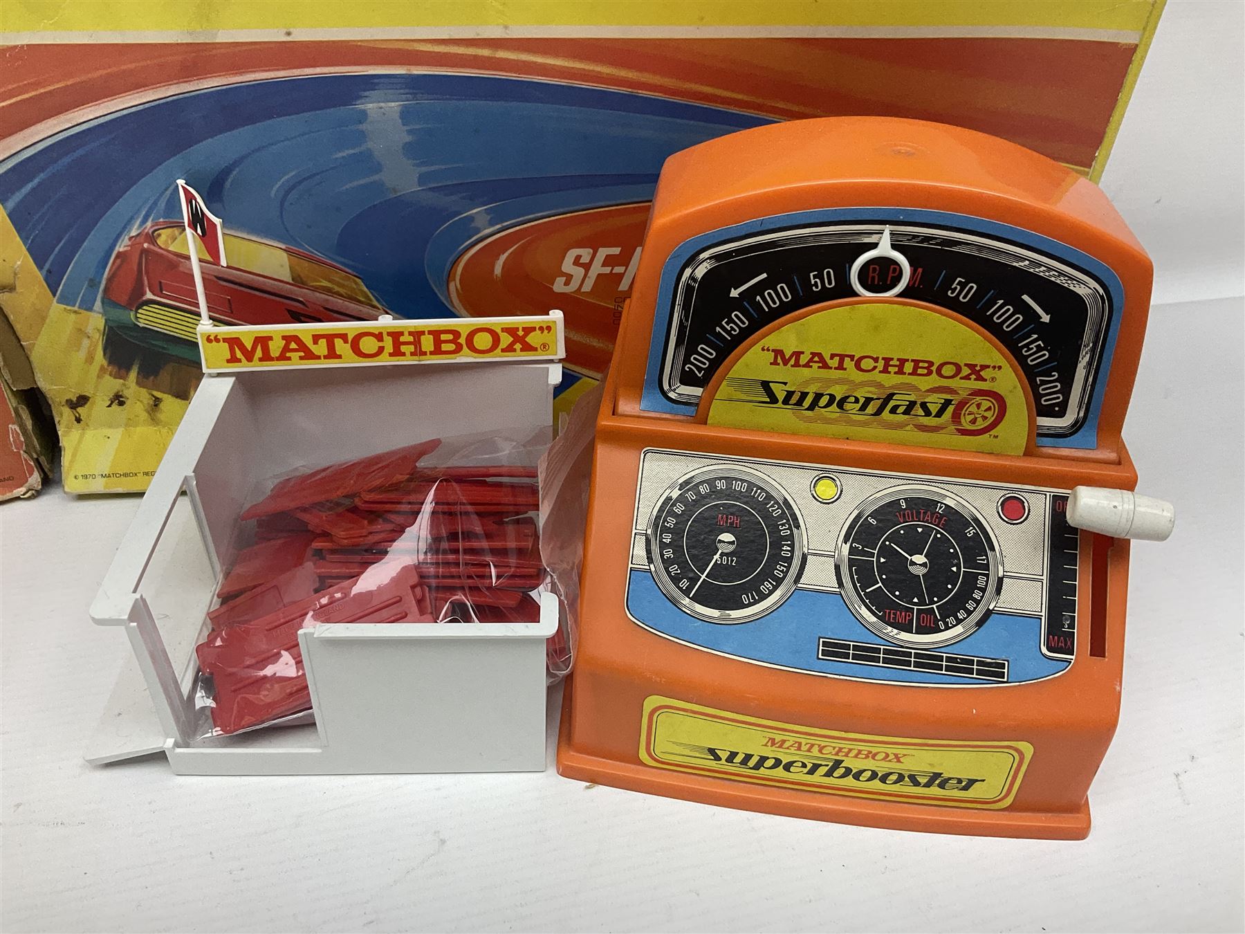 Matchbox Superfast track racing Set with Superbooster and two boxed SF-17 Slipstream Curves; together with five boxed Superfast models - 3d Monteverdi Hai, two 7d Hairy Hustler, 45c Ford Group 6 and 66d Mazda RX500; and quantity of unboxed and playworn other die-cast models