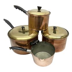 Set of four Jonart copper sauce pans with brass lids