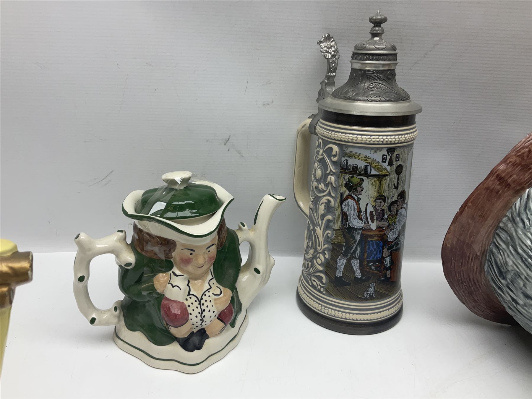 Collection of toby jugs and character jugs, to include Royal Doulton Winston Churchill and Neptune, together with Staffordshire Character Jugs examples  