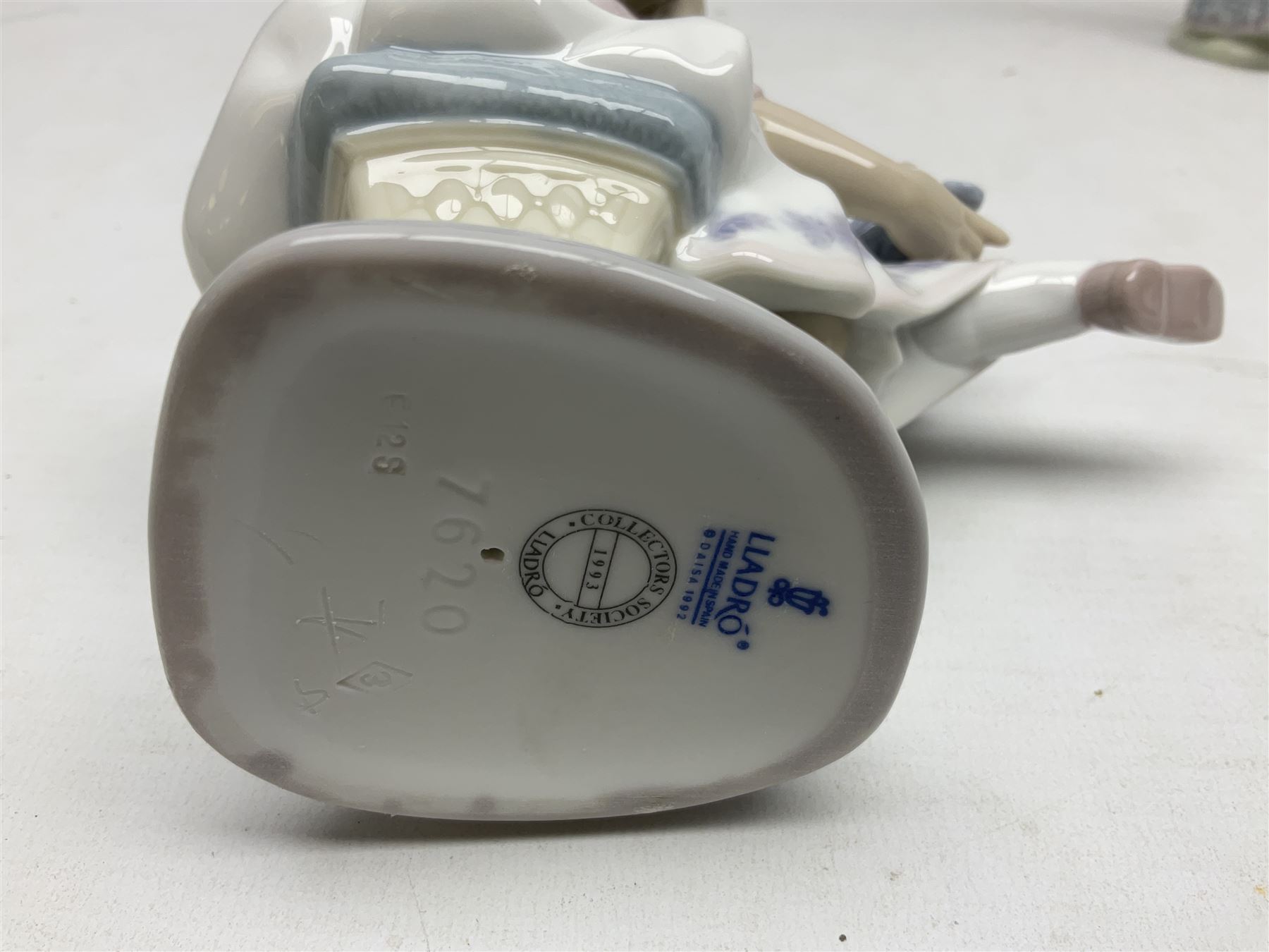 Three Lladro figures, comprising Garden Classic, signed no 7617, Summer Stroll no 7611 and Best Friend no 7620, all with original boxes, largest example H24cm 