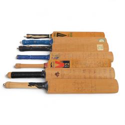 Seven signed miniature cricket bats, each signed by 1990s County Cricket teams, comprising...