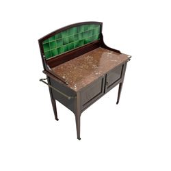 Edwardian inlaid mahogany washstand, raised back with emerald green tiles over marble top, fitted with two panelled cupboard doors, raised on square tapering supports on ceramic castors