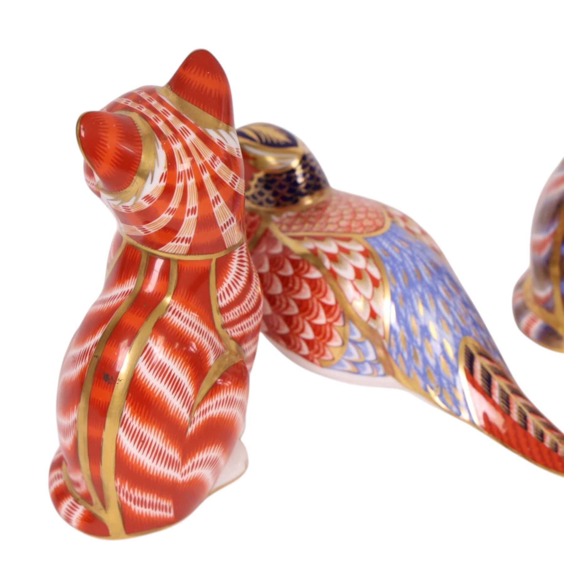 Royal Crown Derby paperweights, including Platypus gold stopper, Kingfisher silver stopper and four others without stoppers