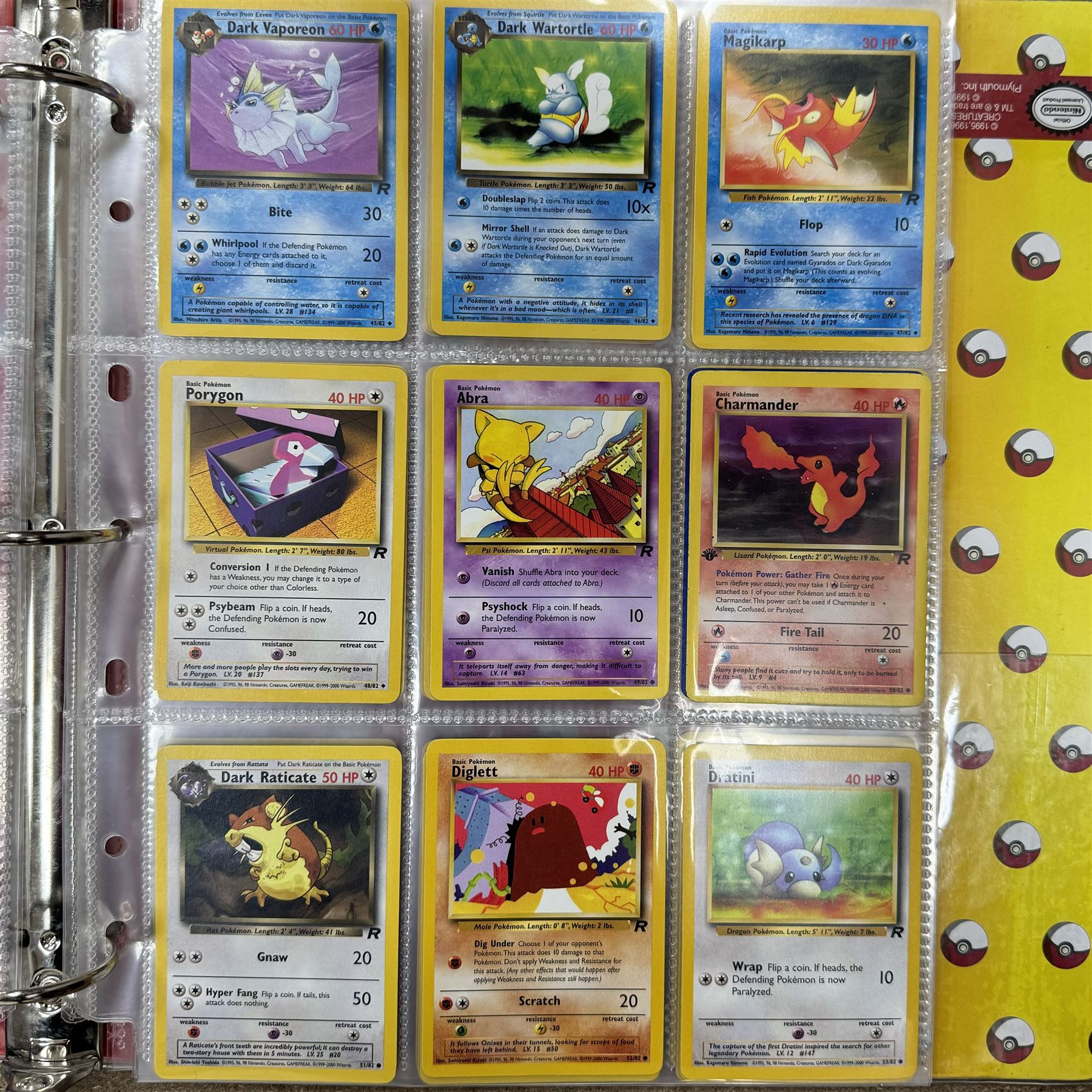 Collection of approximately 400 Pokemon trading cards, mostly 1999 Wizards Pokemon cards to include 1st Edition Dark Gyarados holo 8/82, Dark Charizard 4/82 holo and 21/82 non holo, Dark Blastoise 3/82 holo and 20/82 non holo, Dark Raichu holo 83/82, Dark Dragonite 22/82, eleven first edition cards, Japanese cards, Trainer cards, etc, together with an album of Pokemon the First Movie cards, a voice actor signed copy of Pokemon: The First Movie Animation Comics Mewtwo Strikes Back #1, 5305/8000 with certificate of authenticity with comics 2, 3 and 4 