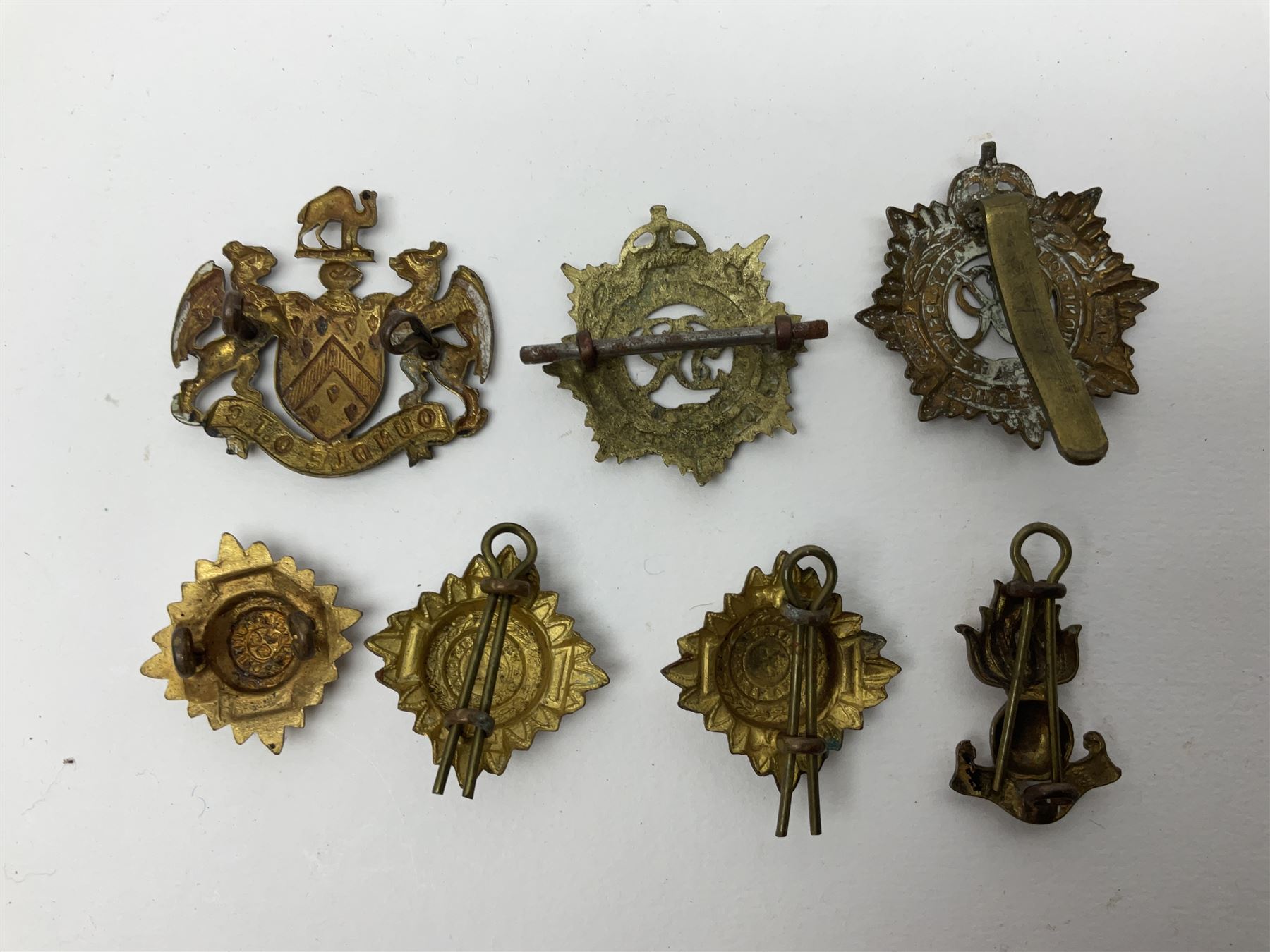 WW2 German Luftwaffe Mess cutlery comprising table spoon and fork, each with H.M.Z.38 mark; WW1 British War Medal awarded to L-13858 Gnr. J. McCabe R.A.; and small quantity of military badges, rank pips etc