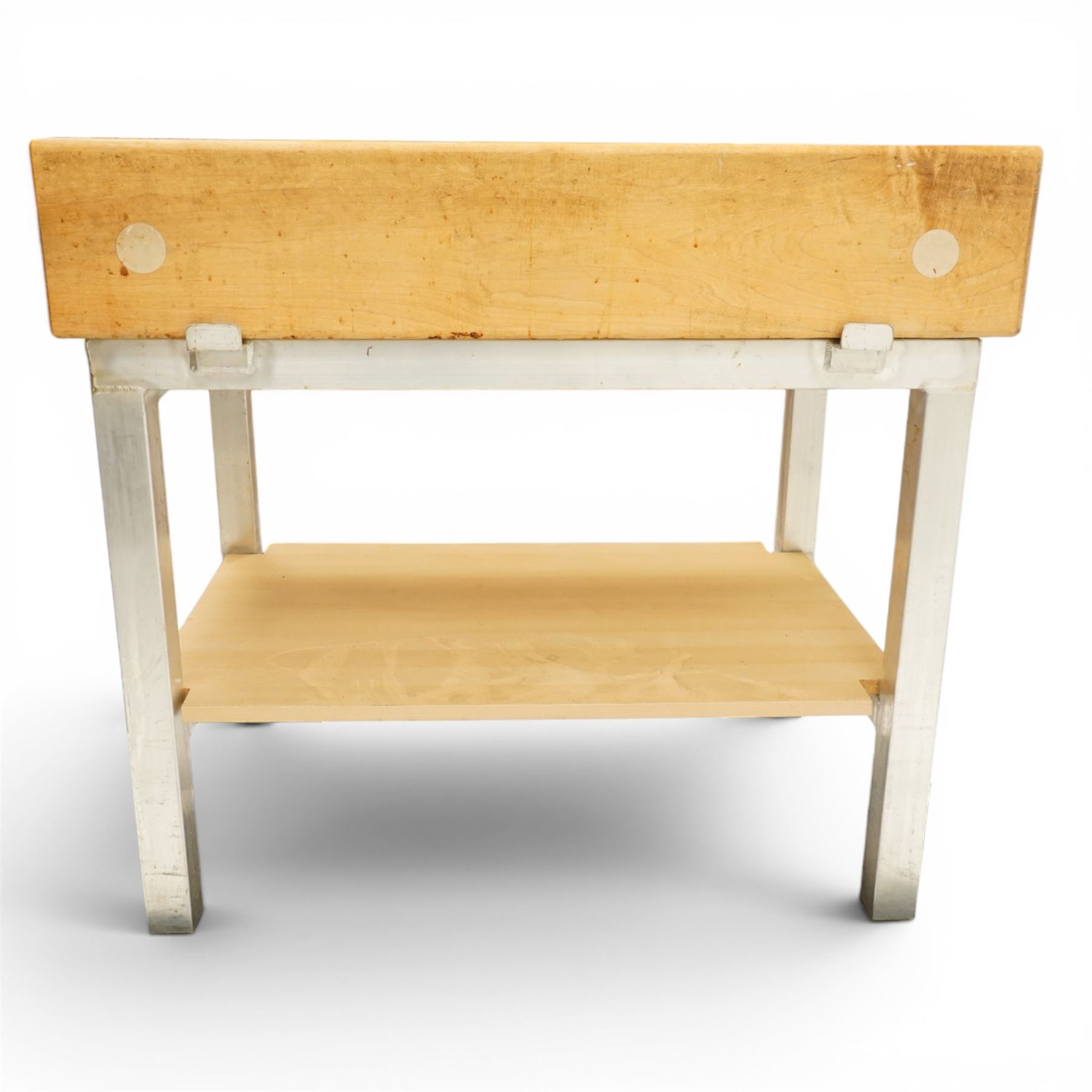 20th century butchers block kitchen island, solid top raised on stainless steel supports united by and undertier