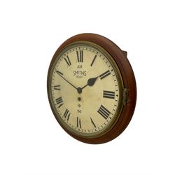 A round dial wall clock with a 15” mahogany bezel and 12” painted dial, with Roman numerals, minute track and streel spade hands, dial inscribed “ AM Smiths, 8 Day, 1941”, with a flat glass and brass bezel, dial pinned to a single train fusee movement. With pendulum.
