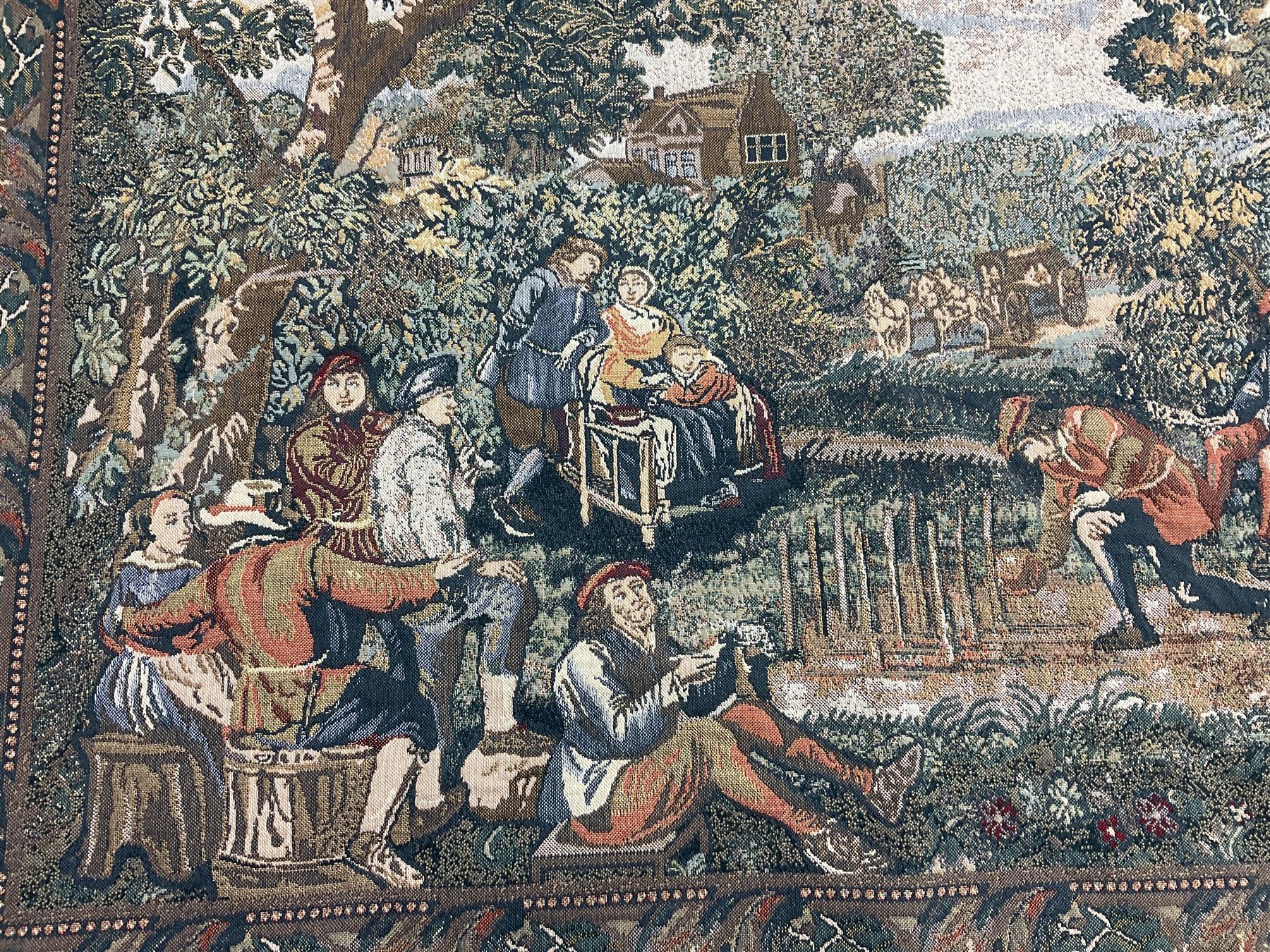 Three tapestries comprising 20th century wool tapestry panel of a medieval nobleman upon a horse with a castle in the distance, together with a smaller tapestry depicting The English Coat of Arms, both hung on rails, and further depicting village scene, largest approx 132cm x 95cm