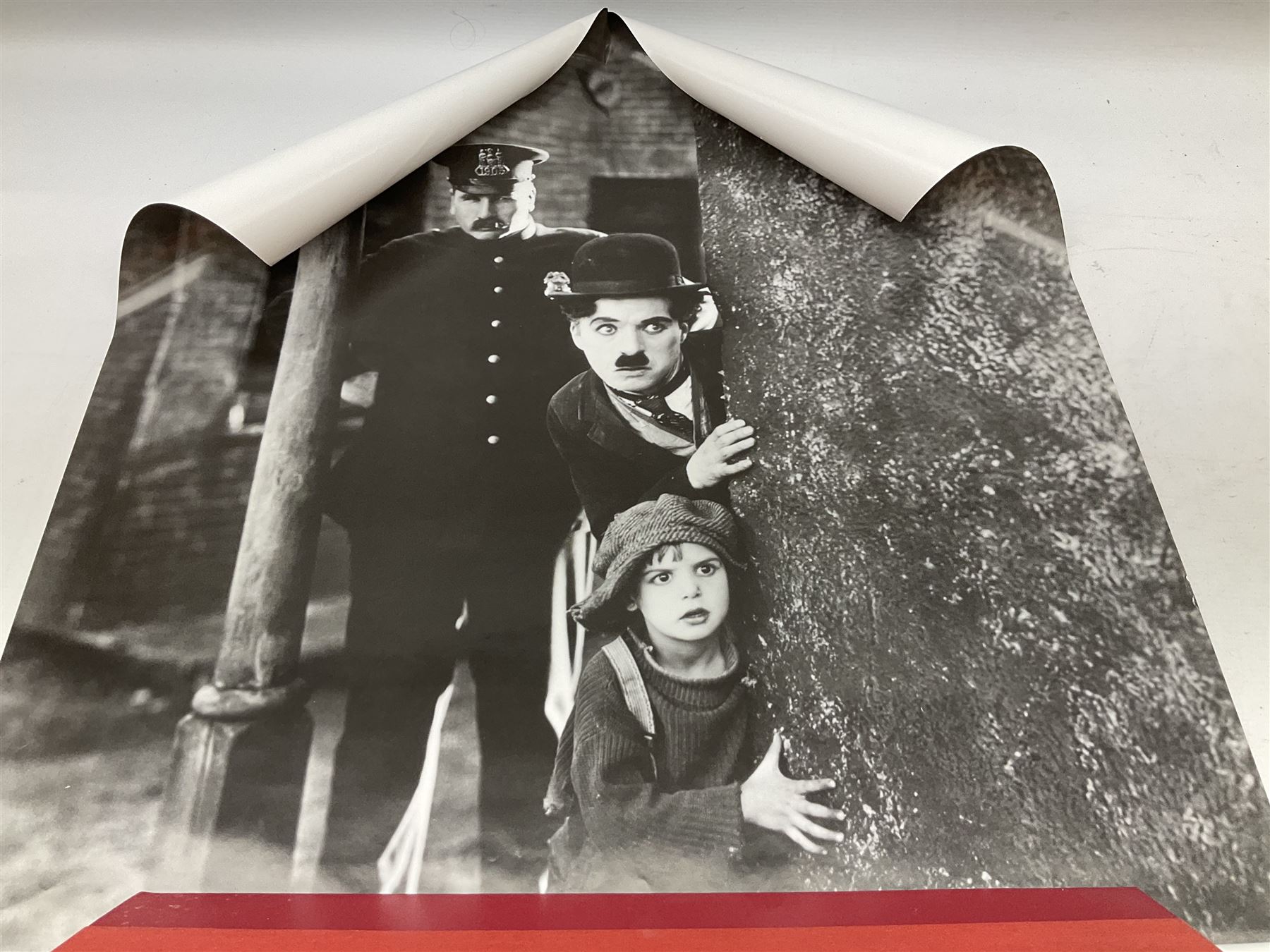 Three unframed posters - John Lennon, Frank Sinatra and Charlie Chaplin; quantity of unframed prints including The Shell Collection portfolio; and a framed print