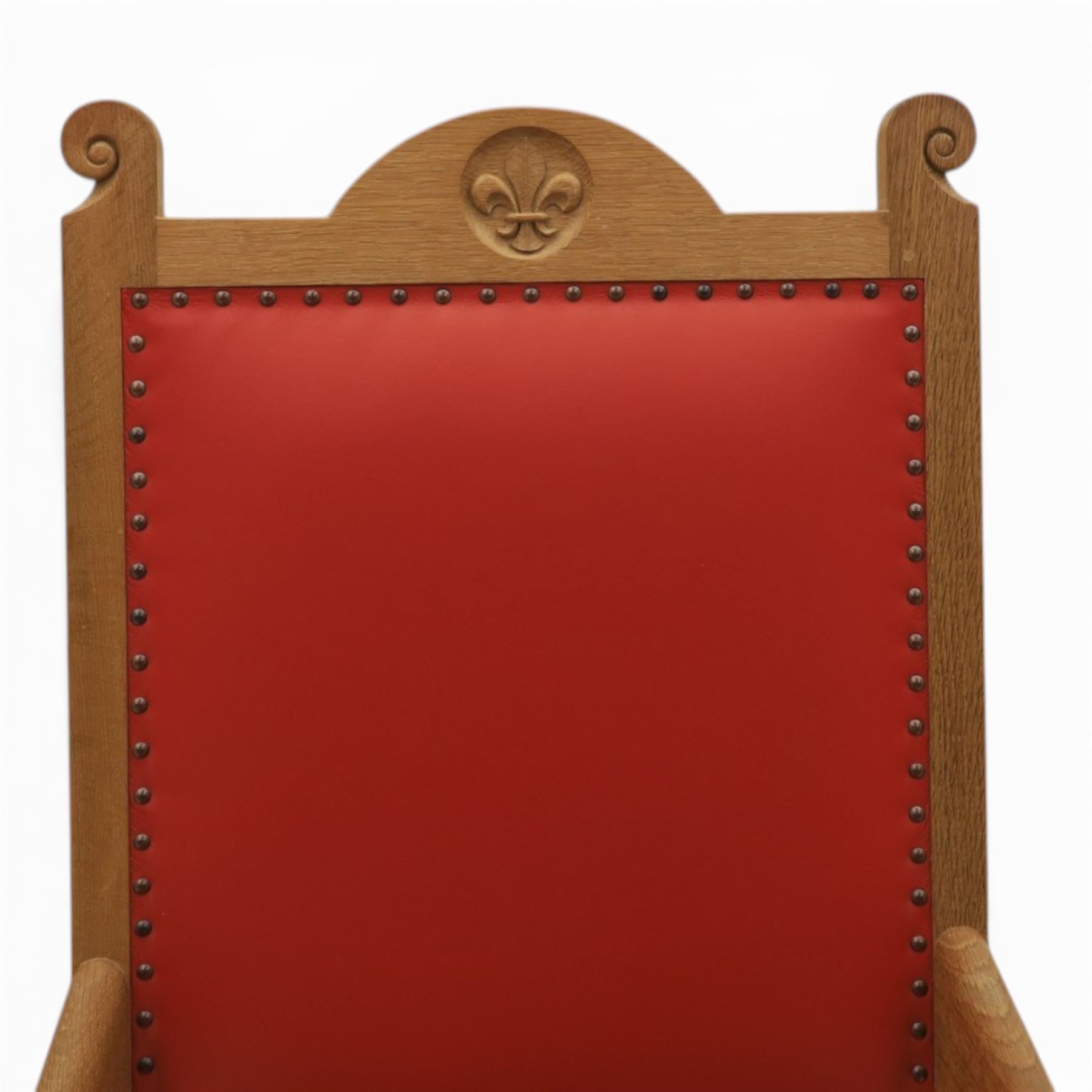 Mouseman - oak armchair high back with fleur de lis motif, red leather padded seat with brass studded trim, with carved mouse signature, by the workshop of Robert Thompson of Kilburn