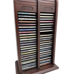 Panasonic 32 inch TV with DVD player and wall bracket and CD rack including various CDs 