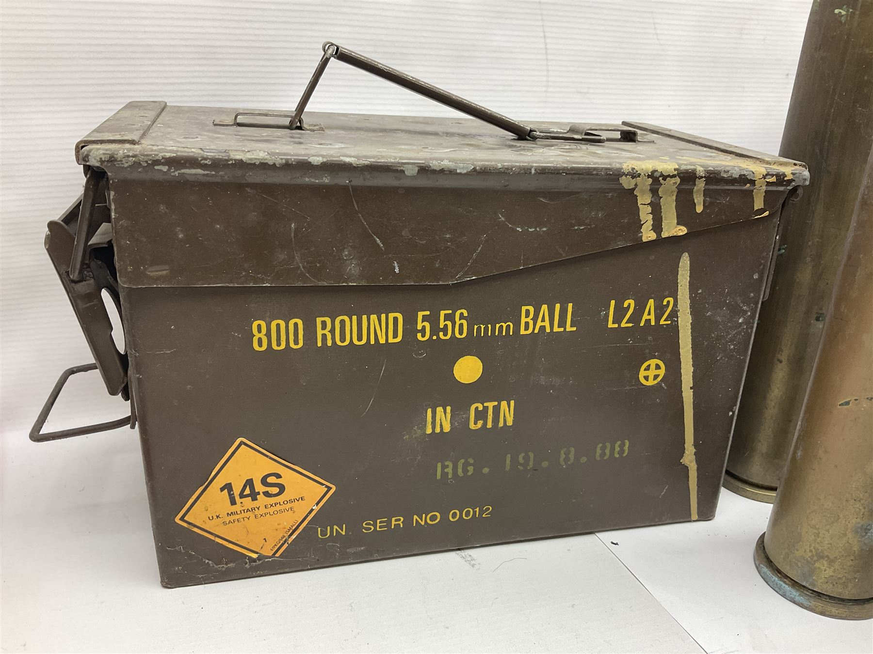 Large collection of shell and bullet casings, including a trench art example, together with a metal cartage case and wooden case