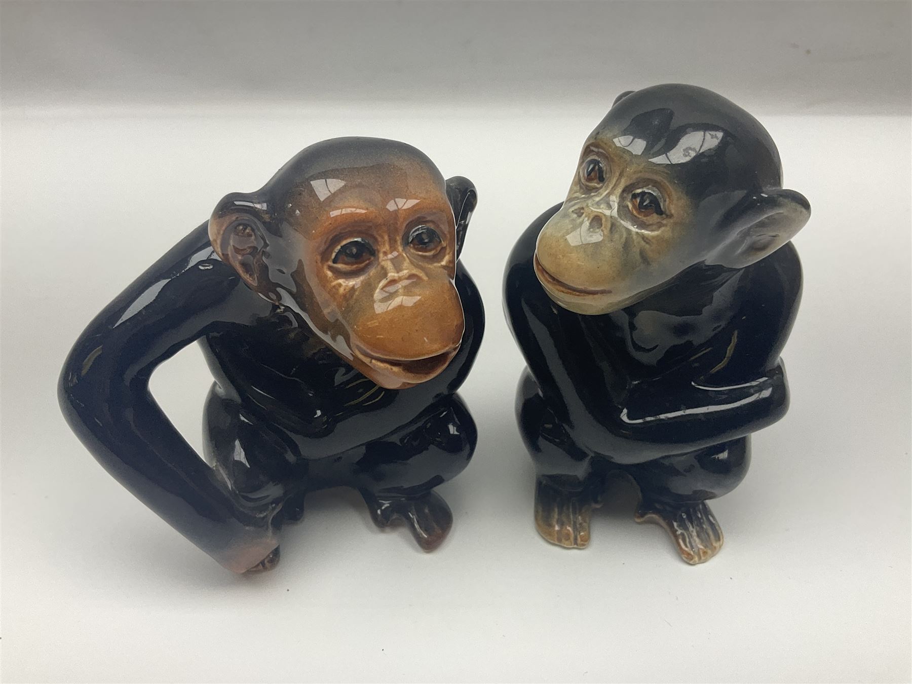 Large Sylvac monkey together with three smaller monkeys, together with Beswick Pigeon no 1383, Melba Ware hippo and baby and Royal Dux elephant 