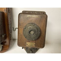 Two Hunningscone patent wall mounting telephones in walnut casing, together with Sterling Telephone & Electric Co. Ltd early wall-mounted telephone 'Primax' and one other 