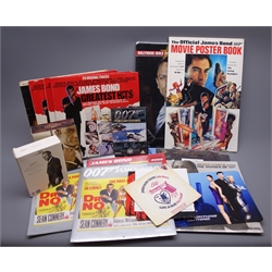  Eight James Bond calendars 2003-10 (two 2004 but lacking 2005), four LP records for Goldfinger and Greatest Hits x3, four 45rpm records of theme tunes, two boxed sets of DVDs and another of 007 The Car Chases  