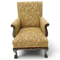 Pair of Chippendale design carved mahogany framed armchairs of stylised lyre form, high square backs and sprung seat upholstered in olive-ground foliate fabric, scrolled arm terminals with applied rosettes, the seat rail moulded with central scallop-and-acanthus motif, raised on shell-carved cabriole supports with ball-and-claw feet