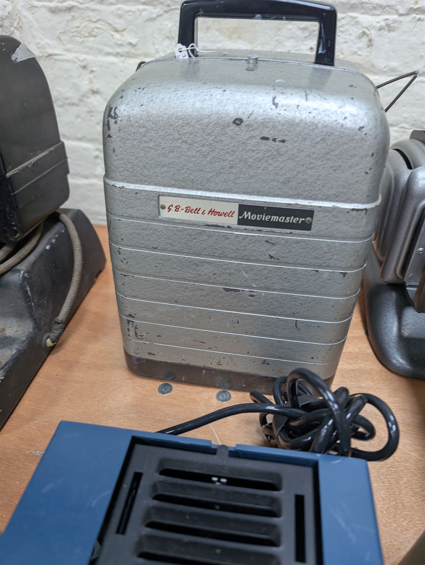 Eight vintage projectors, including Bell & Howell Moviemaster, Aldis 303, Boots Colormaster, Ernst Plank, Hi-Lite etc