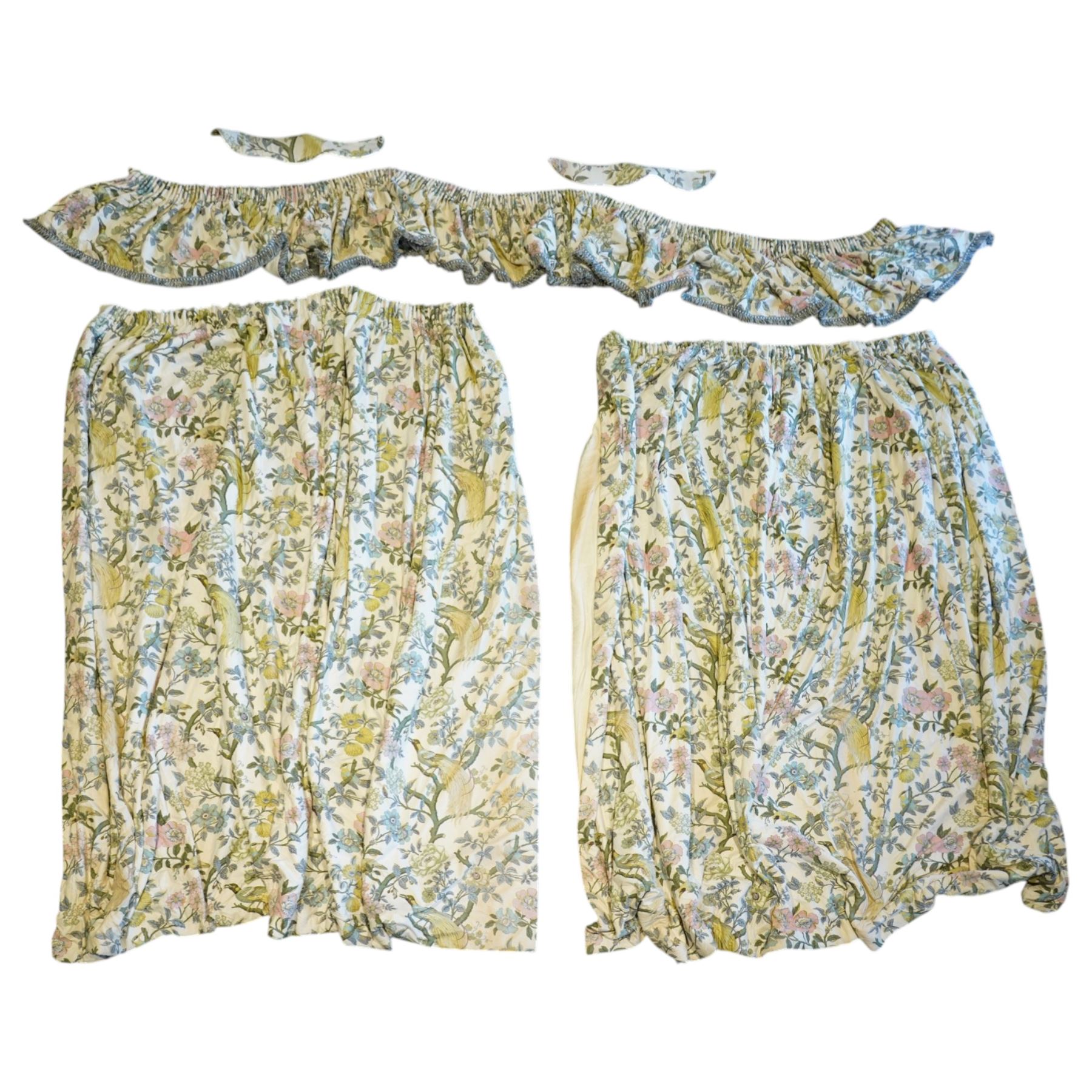 Pair of large quality full length lined and padded ivory ground curtains profusely decorated with birds of paradise and exotic flora, in a predominantly pastel palette

Pelmets W 335cm