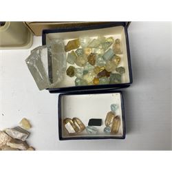 Collection of loose uncut stones including star sapphire, green amethyst, opal, topaz and moonstone and two sets of tools