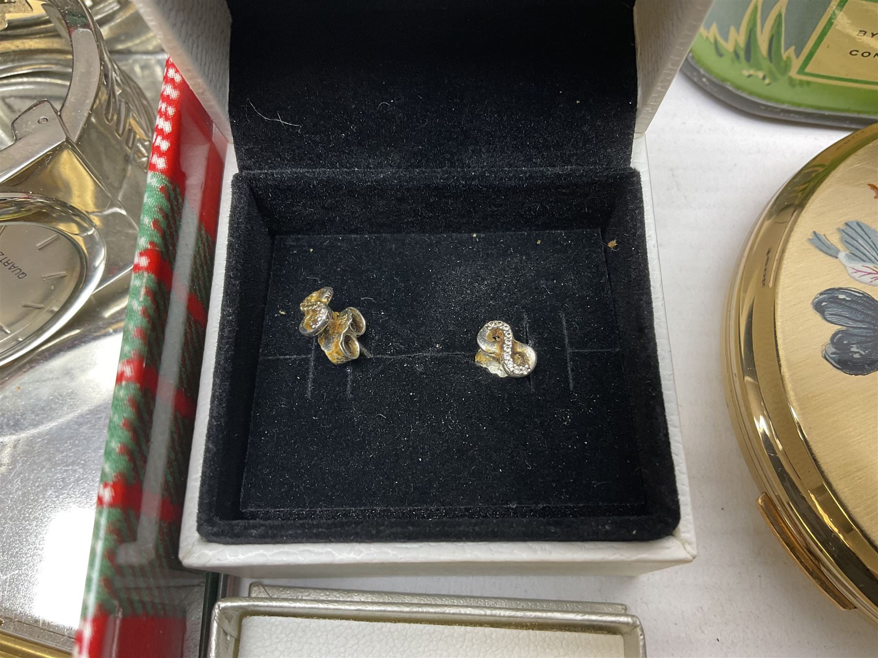 9ct gold bangle, hallmarked, pair of Pandora silver infinity earrings, 9ct gold stone set studs, other silver jewellery, costume jewellery, Stratton compact mirror and a Vincenza glass basket