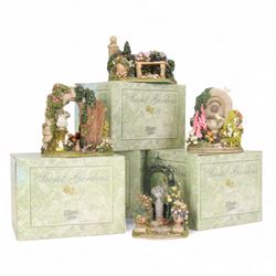 Four Lilliput Lane models, from the Secret Gardens collection, comprising Nature's Doorway, Fruits of Eden, Picnic Paradise and Peaceful Pastimes, all boxed 