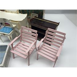 Sindy - furniture and accessories comprising dining suite with separate dresser; two beds; Garden Set; Music Centre; all  boxed; three-piece bedroom suite; settee; Hostess Trolley; two coffee tables; and four-piece bathroom suite including shower cubicle