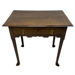 George III oak and elm low-boy, rectangular top with moulded edge, fitted with single drawer cast brass drop handles, shaped apron over cabriole supports terminating in pointed feet