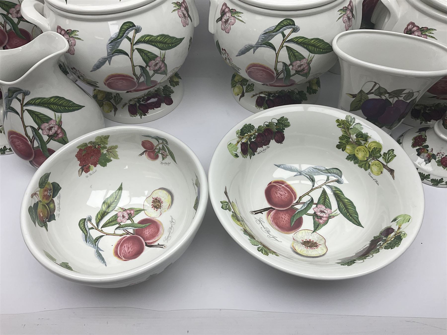Three Portmeirion soup tureens with covers and ladles, together with vases, large bowls and other Portmeirion items