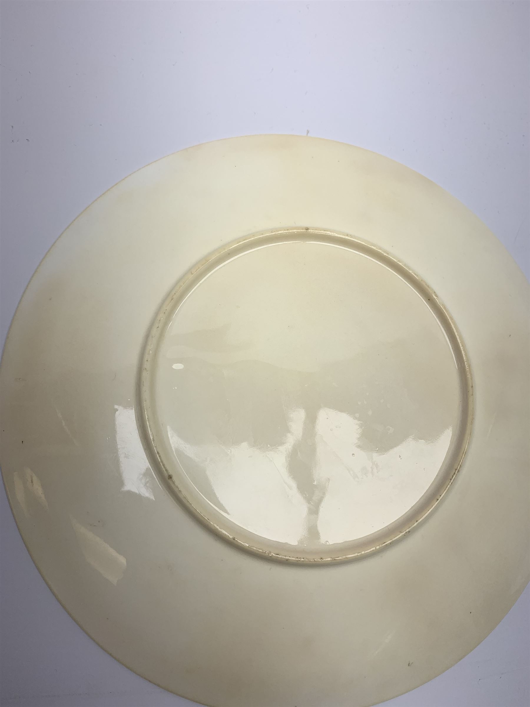 Late 19th century porcelain plate, hand painted by Frederick Sutton, depicting a female figure and putto within a wooded landscape, with recumbent sheep and brook to the fore, signed F N Sutton, unmarked verso, D22.5cm

Frederick Sutton was employed as a painter at the notable factories of Royal Worcester, Coalport, and Minton. 