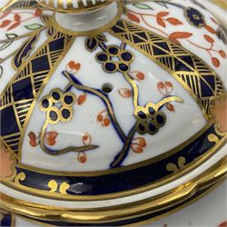 Early 20th century Royal Crown Derby teapot, decorated in a variant of the Imari pattern with blue and red prunus blossoms, with printed mark beneath including illustration date code for 1927, H14cm
