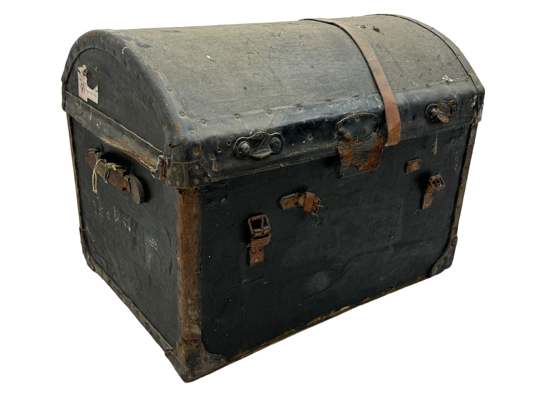 Early 20th century travel trunk, domed top with leather straps and metal rivet detailing, wooden frame with black canvas covering, interior lined with striped fabric, manufacturers mark to the inside 