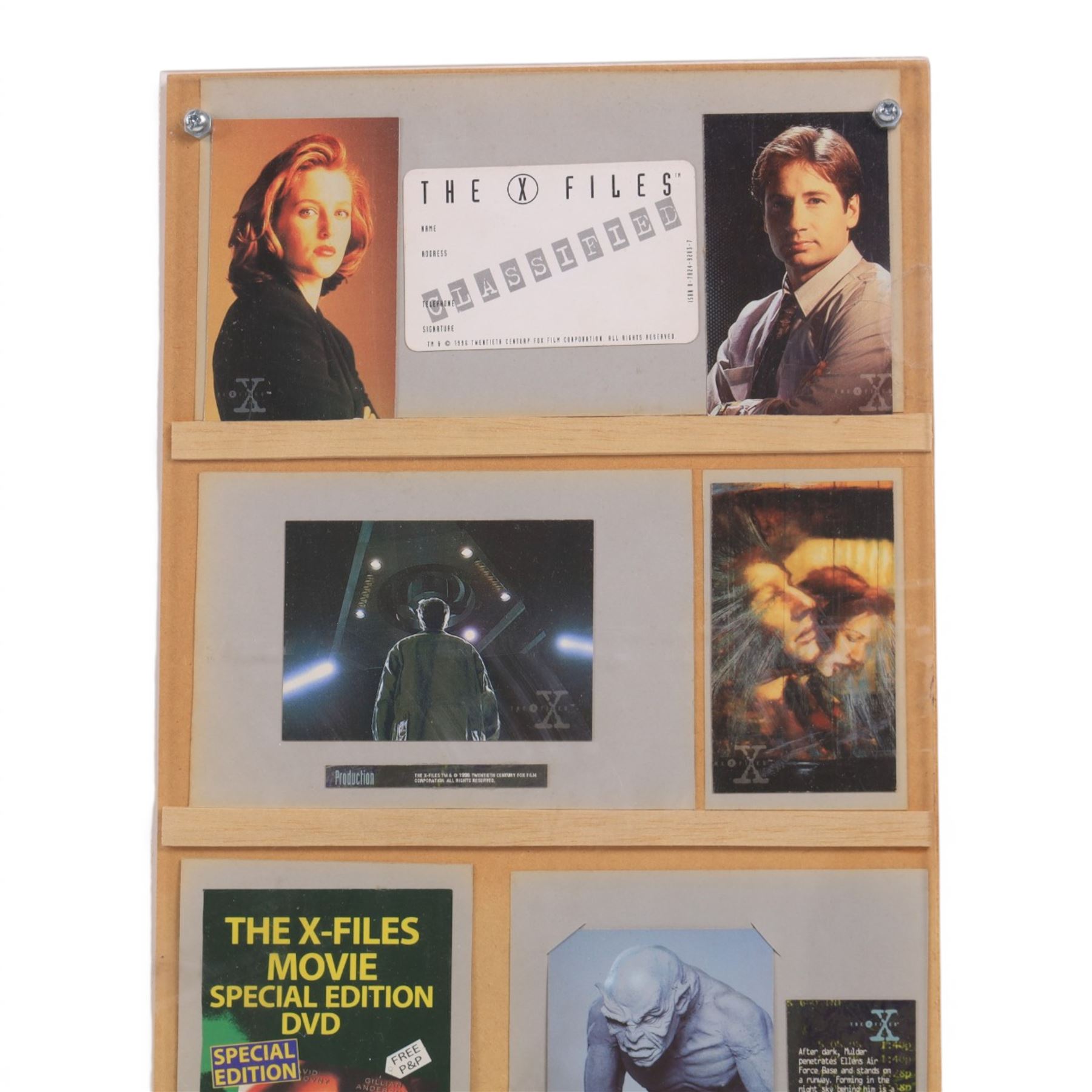 The X Files montage, including cast images, stills and advertisements, within acrylic frame, together with a Judge Dredd montage, including comic cover and comic strips, largest 46x61cm

Notes: This item is from the private collection of Arthur C. Clarke's brother.