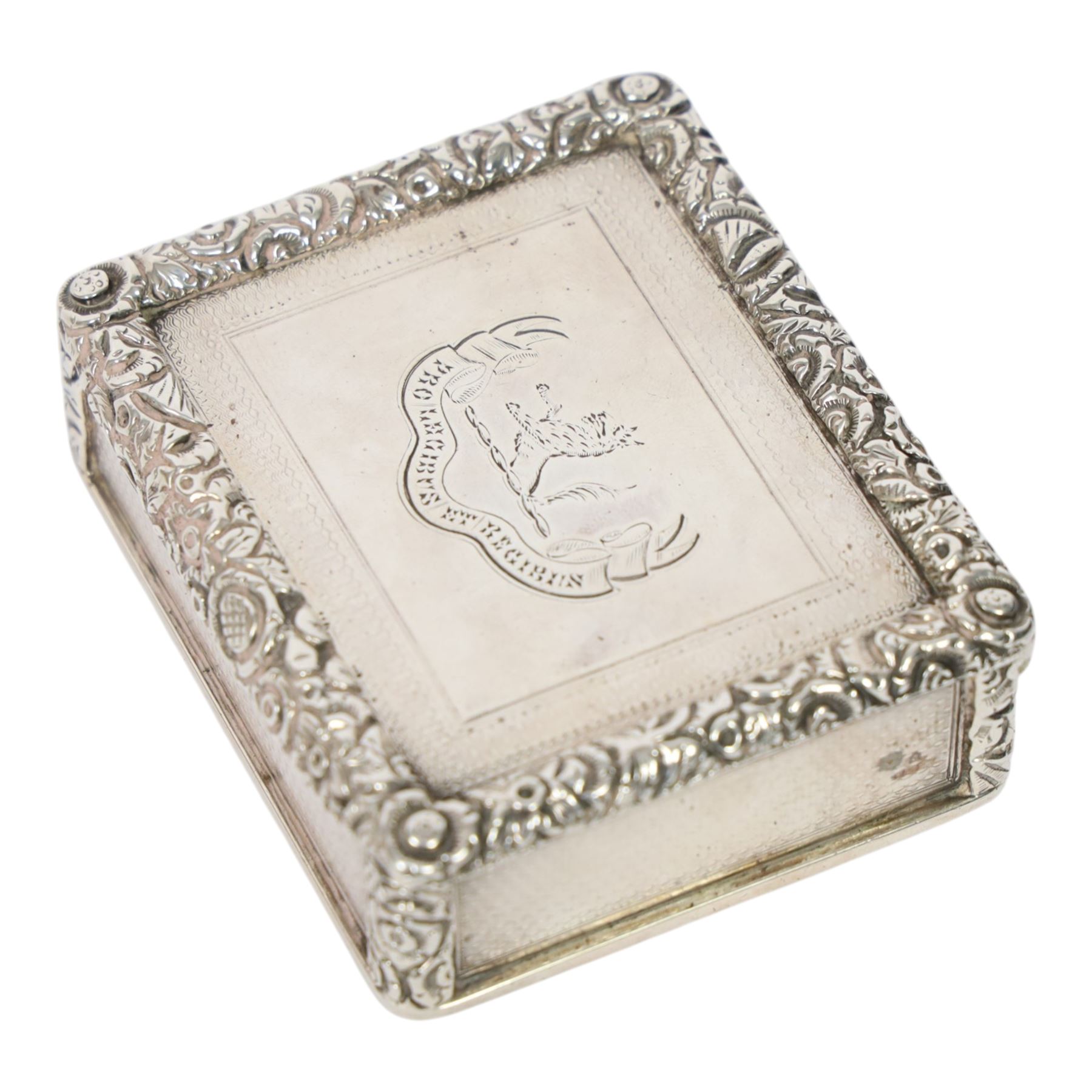 Rare Victorian silver provincial snuff box, of rounded rectangular form, the hinged cover with central engraved crest above motto 