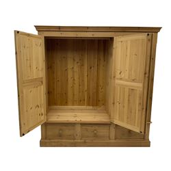 Solid pine triple wardrobe with three drawers