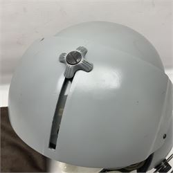 Silver grey SPH-4B Flight Helmet as used by helicopter pilots in the USAF and US Army in the 1990s; made of epoxy resin reinforced fibreglass; fitted with clear and tinted visors and complete with an M-87A/AIC boom mike; original condition and bench tested.