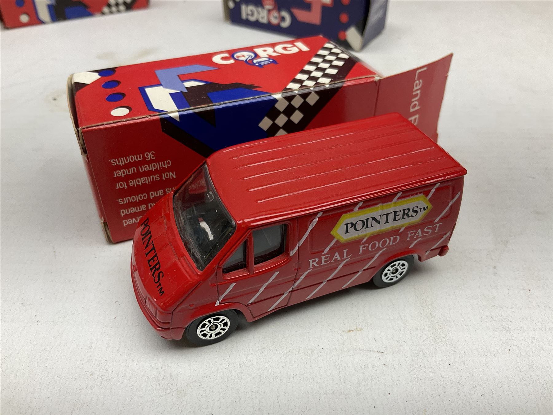 Corgi - thirty-four modern die-cast models including cars, commercial vehicles, racing cars, sports cars, car transporters etc; all boxed; Bburago boxed set of five cars; four Matchbox Originals blister packs etc