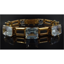  Graduating emerald cut aquamarine 18ct gold link bracelet  