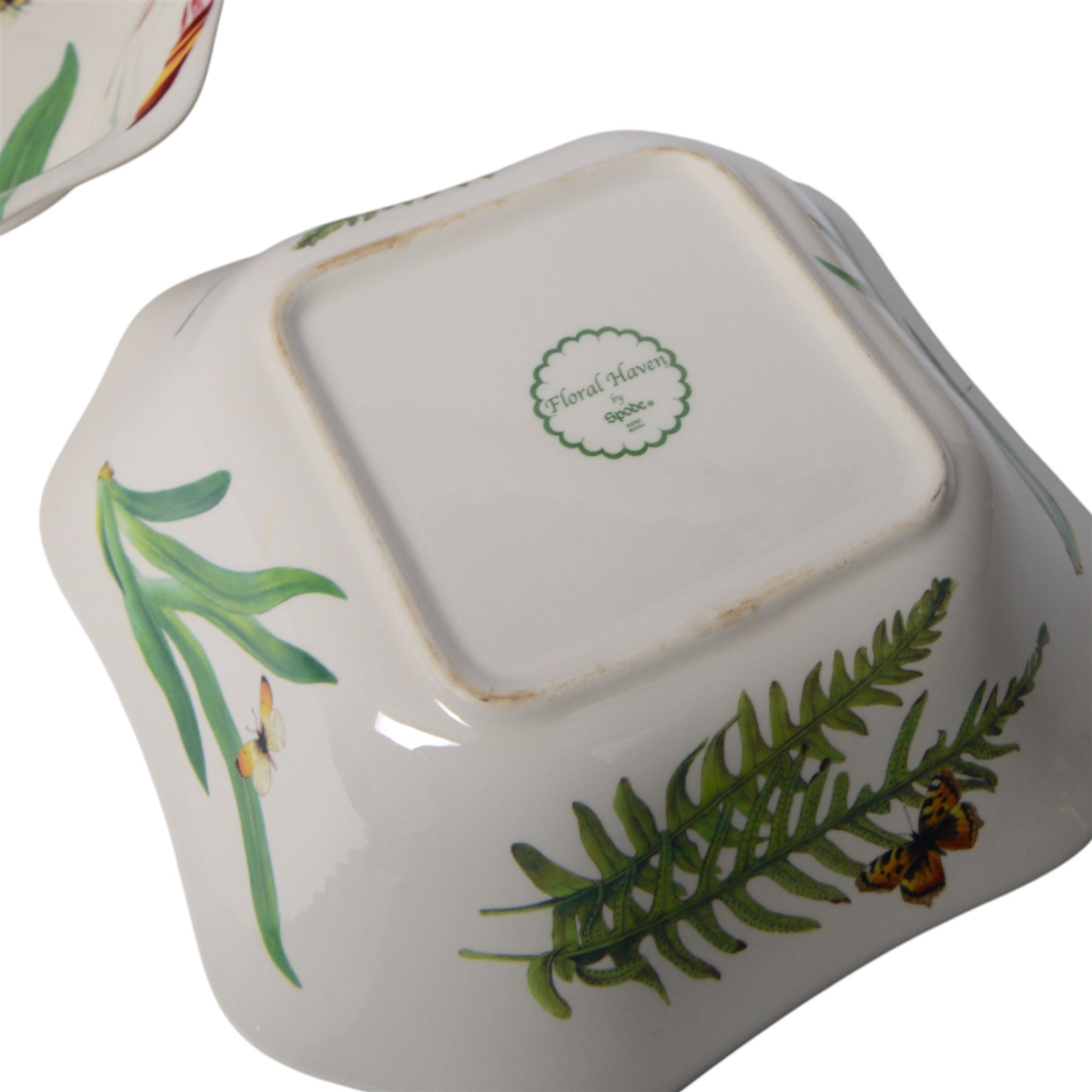 Modern Spode dinner service for twelve plates settings, decorated in the Floral Haven pattern, comprising large plates, smaller plates, dishes, side plates, and pair of serving bowls, largest plates D32cm