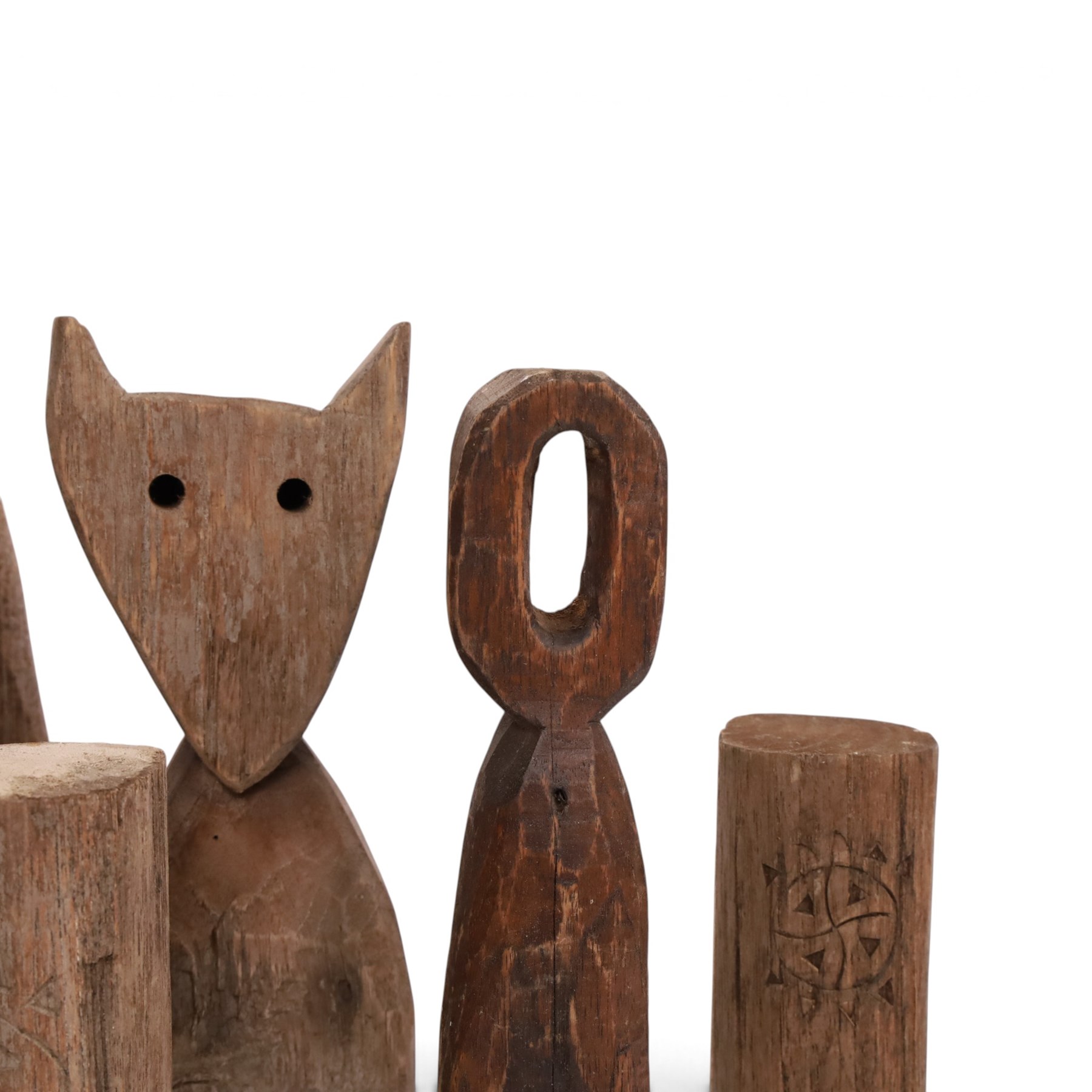 Hand carved folk art figures, including totems, mushroom and cat, largest H34cm