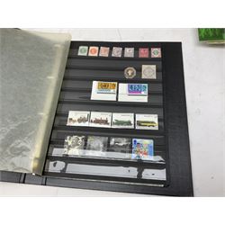 Stamps and related items, to include PHQ cards in various albums, Queen Elizabeth II usable mint mostly loose in stock books, King George VI Leeward Island one pound mint stamp etc
Great Britain and world stamps, including including mostly and Royal Mail PHQ cards