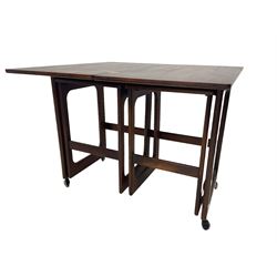 Mid-20th century teak nest of tables, with fold-over top