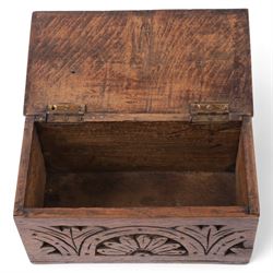 Carved oak box, the hinged lid with a carved diamond motif, the sides and front carved with stylised flowers, H12cm, L24cm