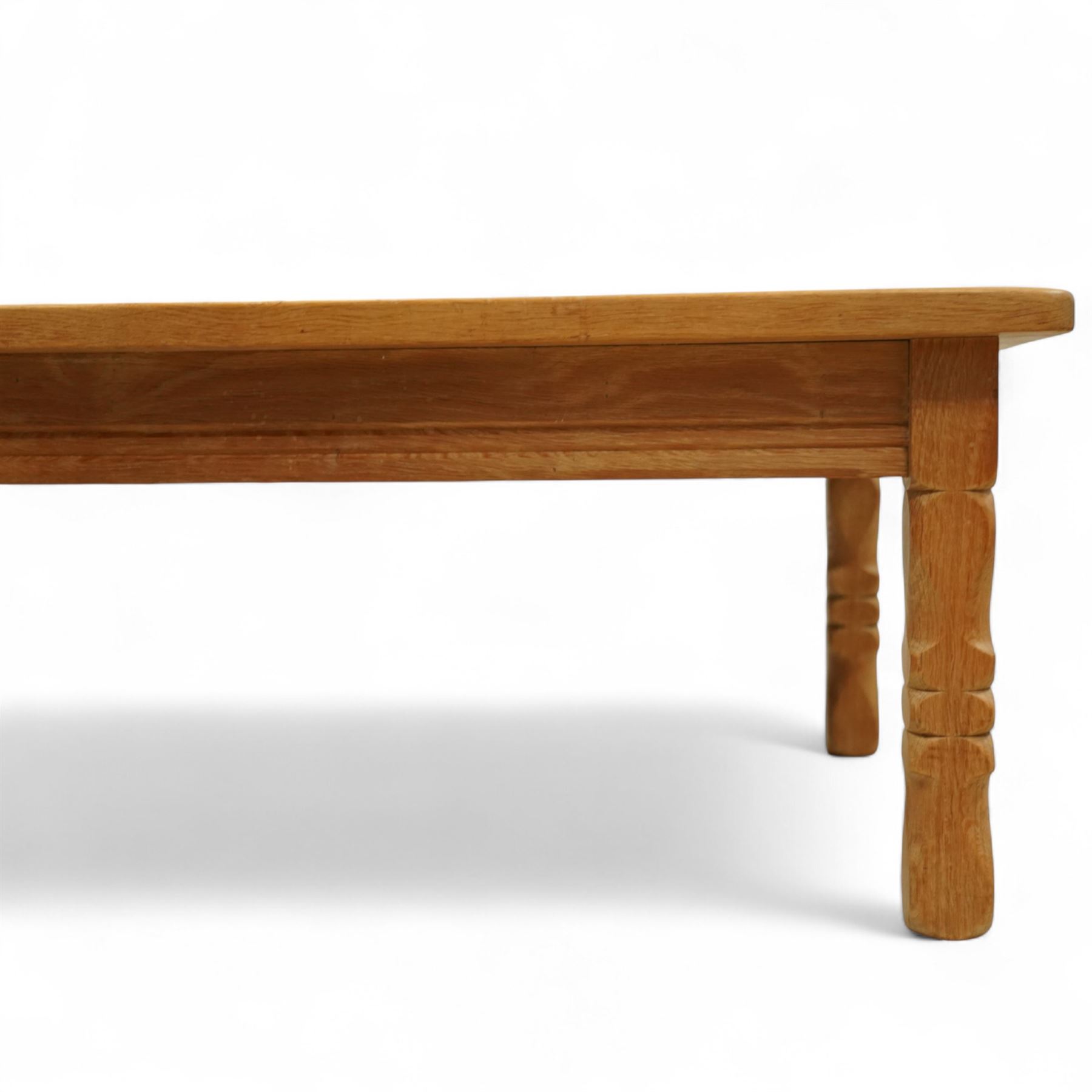 Mid-20th century light oak coffee table, retailed by Danish Homestores, Nottingham, rectangular top with prominent grain figuring, raised on turned supports