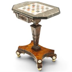 Early 19th century Anglo-Indian rosewood and specimen marble chess table, the octagonal top inset with a chequerboard of various coloured marbles within a broad fossil marble border and black marble edge, over a foliate and rosette carved frieze and turned-and-tapering pedestal with lotus-carved decoration, on a concave-sided quadripartite platform base with anthemion carved scroll terminals, inset ivory roundels and brass bun feet