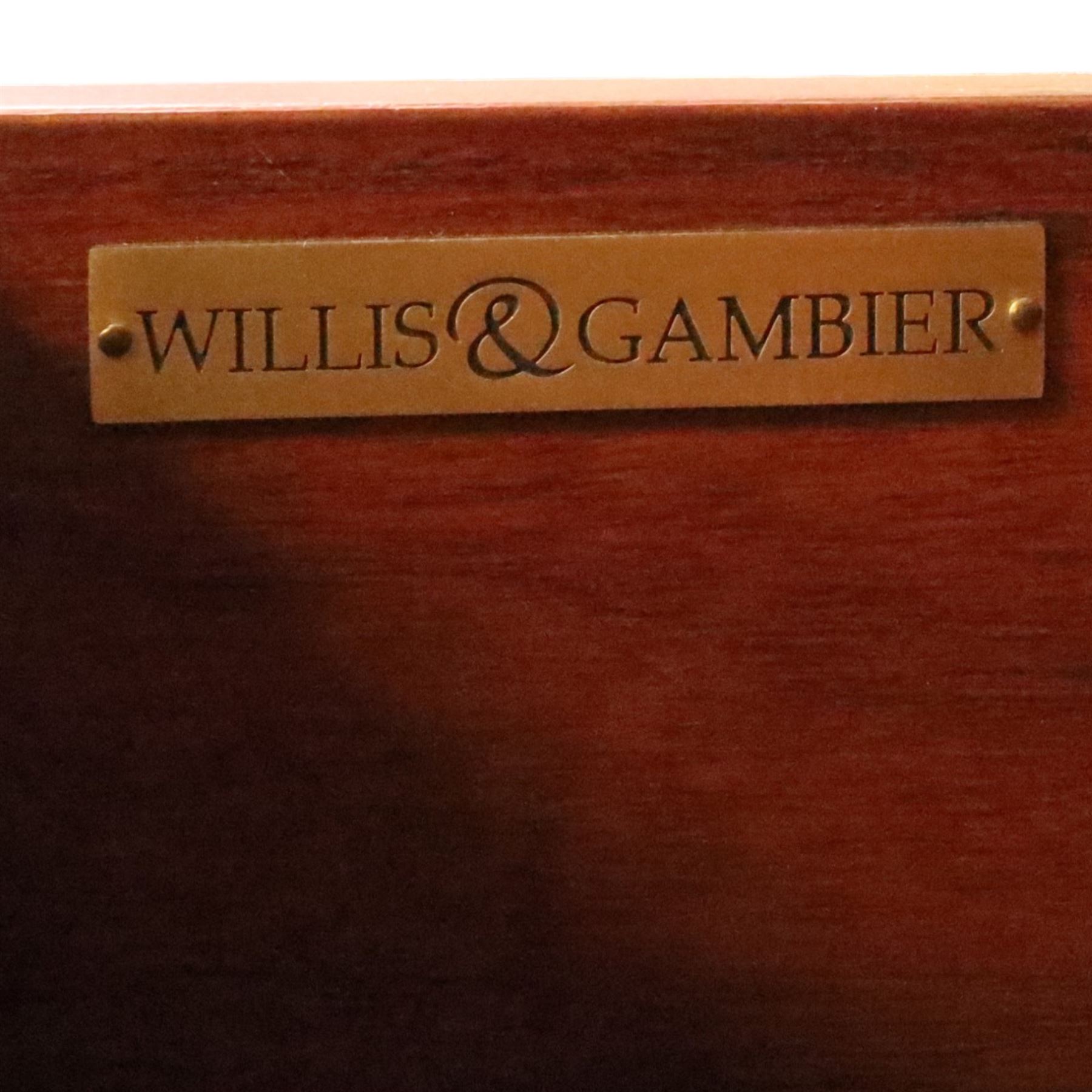 Willis & Gambier - mahogany tall chest, rectangular chamfered top, with frieze drawer with blue baize lining, over six graduating drawers with black pulls, raised on bracket feet