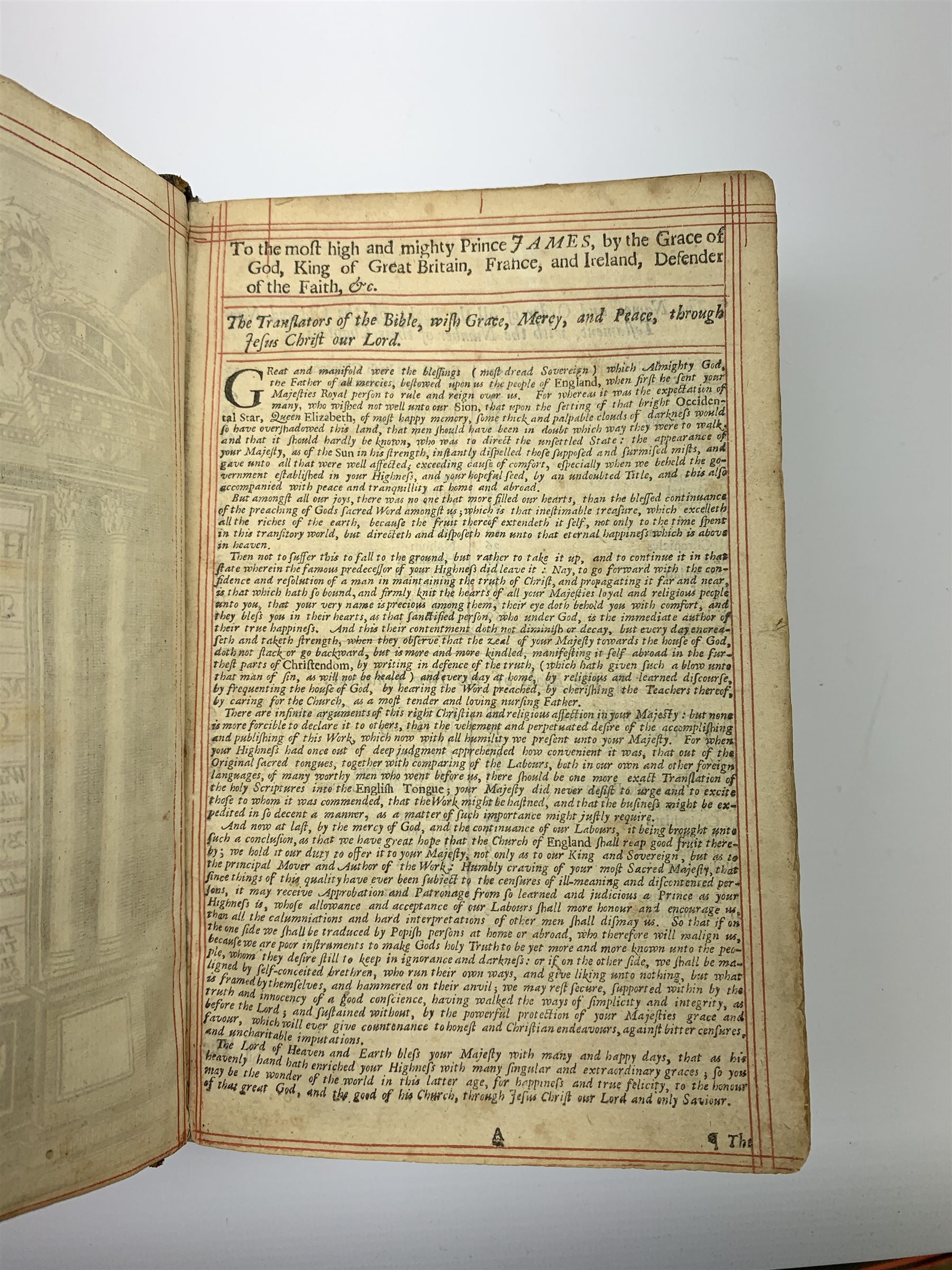 Early 18th century Holy Bible. 1711. London. Printed by The Assigns of Thomas Newcomb and Henry Hills, deceas'd. Printers to the Queens Most Excellent Majesty. Engraved title page. Red lined pages. Full tooled leather/gilt binding with aeg.