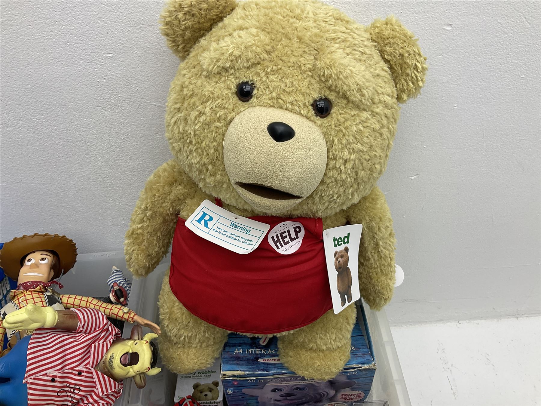 Two Barbie Pink Label Twilight figures in boxes, Ted wacky wobblers in boxes, Minion Dave in box, Toy Story Woody doll etc in two boxes