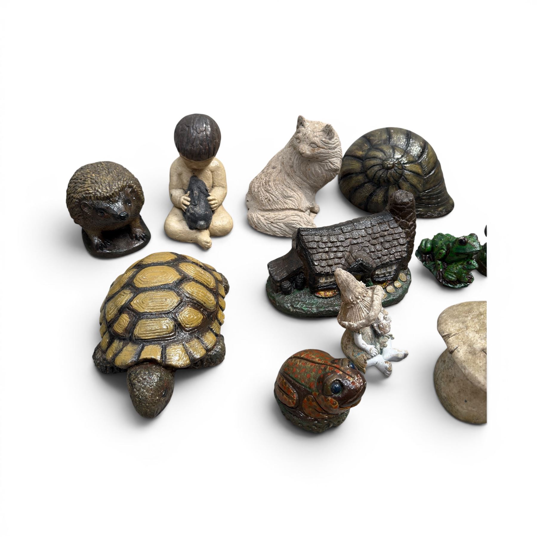 Collection of 33 small glazed cast stone garden animals and figures