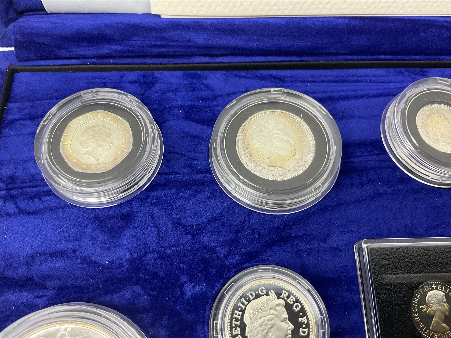 The Royal Mint United Kingdom Millennium 2000 silver coin collection, cased with certificate