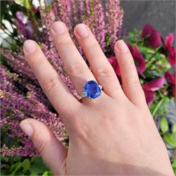 French 18ct white gold and platinum three stone unheated Ceylon sapphire and diamond ring, the single mixed cushion cut sapphire of 8.49 carat, with Gem Paris report, flanked by pear cut diamonds, hallmarked, total diamond weight approx 0.60 carat
